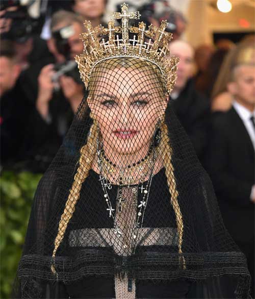Madonna posing for a photo.